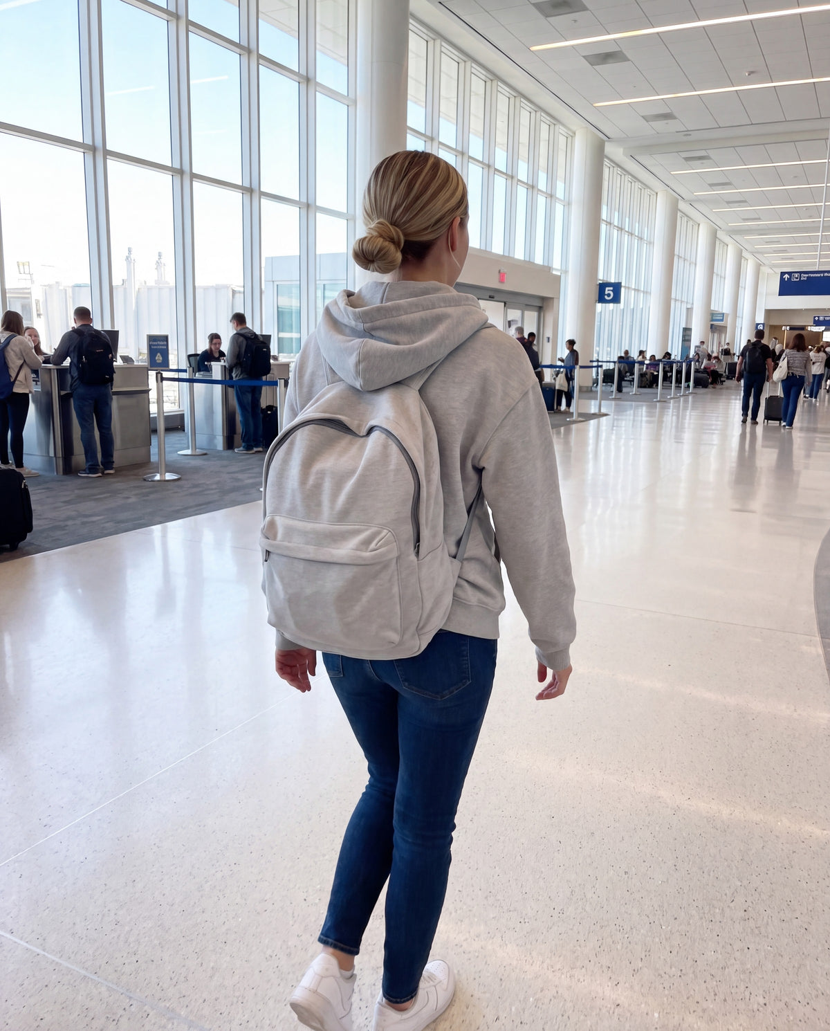 Gray PackHoodie worn at the airport